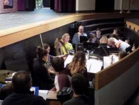 Student and community orchestra practice for spring musical